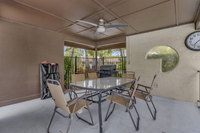 view of patio with ceiling fan and grilling area