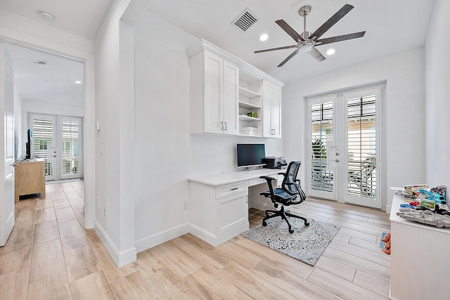 office area with ceiling fan, light wood-type flooring, and french doors