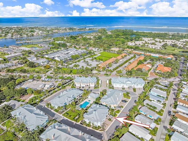 drone / aerial view with a water view