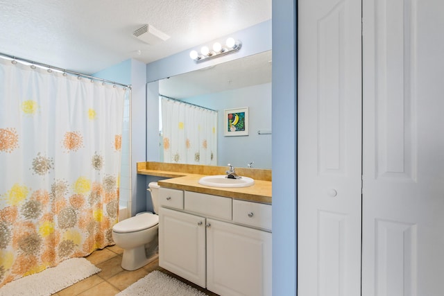 full bathroom featuring toilet, a textured ceiling, tile patterned floors, vanity, and shower / bathtub combination with curtain