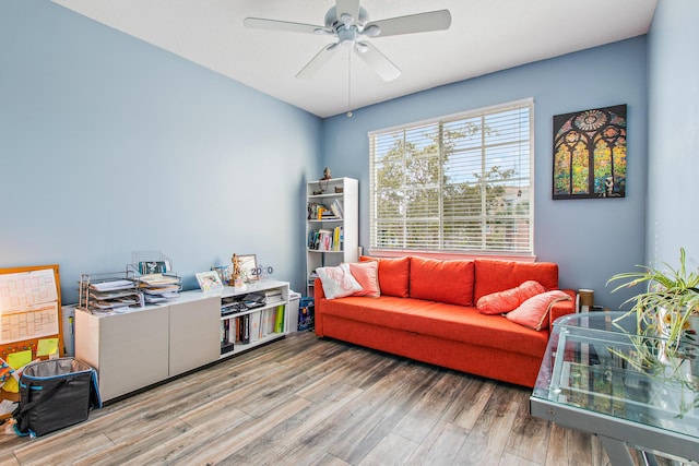 interior space with hardwood / wood-style flooring and ceiling fan