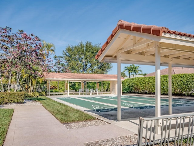 view of community with shuffleboard