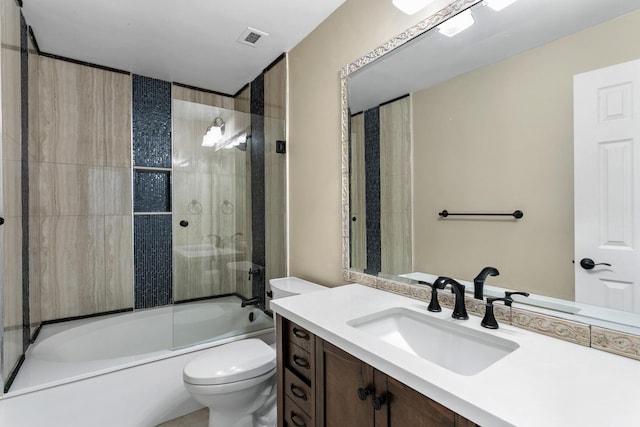 bathroom featuring toilet, visible vents,  shower combination, and vanity