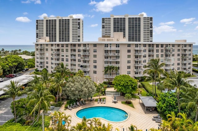 community pool featuring a water view