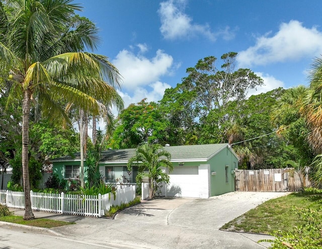 single story home with a garage