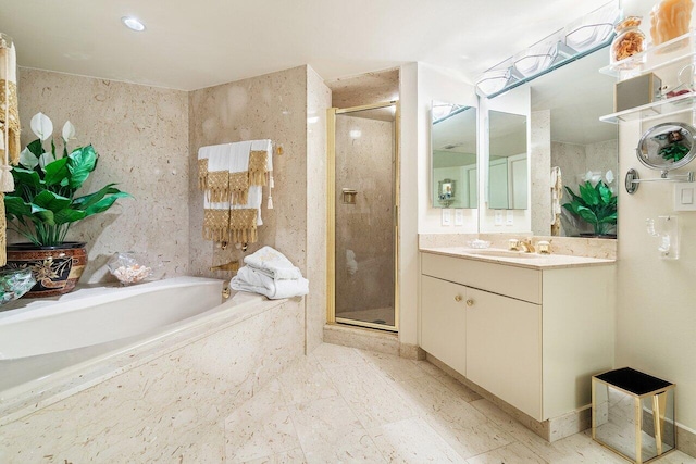 bathroom with vanity, independent shower and bath, and tile patterned floors