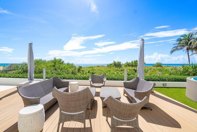 wooden deck with a water view