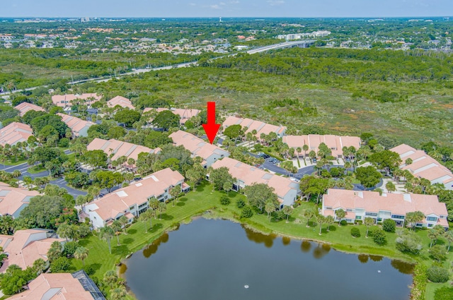 birds eye view of property featuring a water view