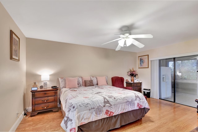 bedroom with access to exterior, ceiling fan, light hardwood / wood-style floors, and white refrigerator with ice dispenser