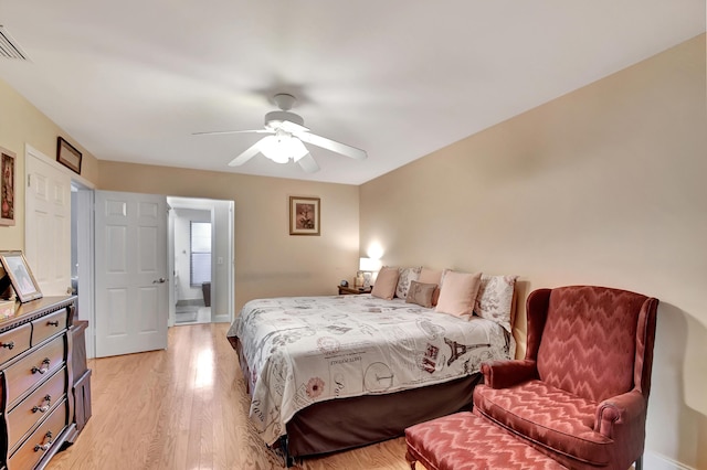 bedroom with ceiling fan and light hardwood / wood-style floors