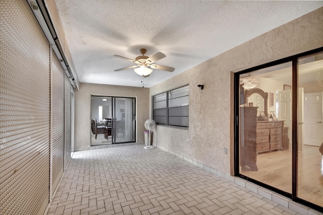 interior space with a textured ceiling