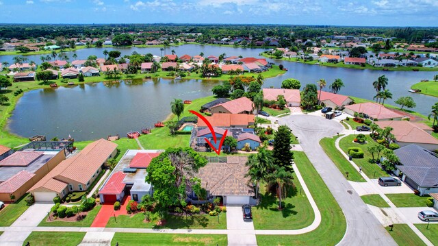 drone / aerial view with a water view