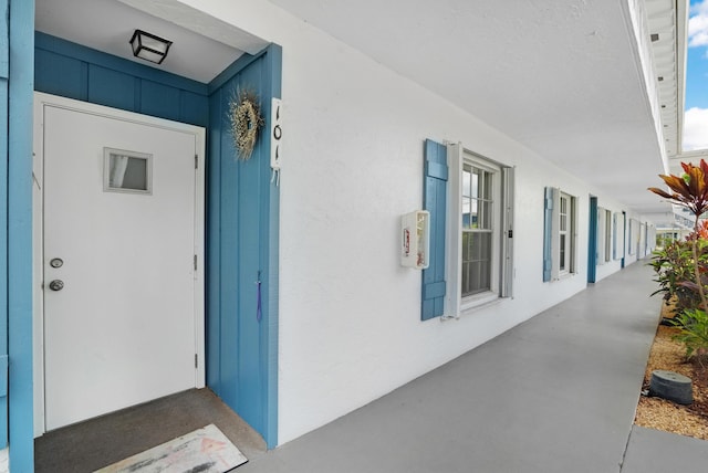 1854 SW Palm City Rd Unit 101, Stuart, FL 34994 - view of exterior entry with stucco siding