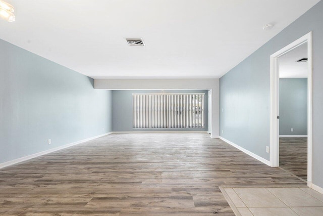 empty room with light wood-type flooring