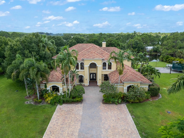 view of front of home with a front yard