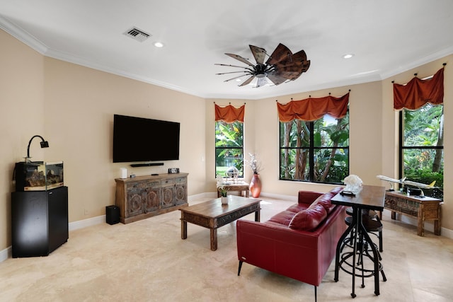 living room with crown molding and ceiling fan