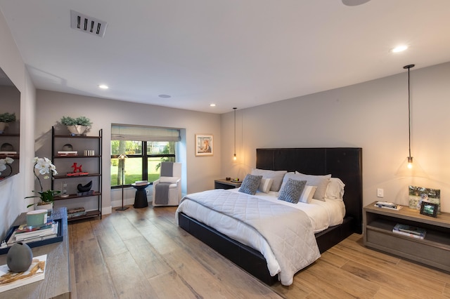 bedroom featuring hardwood / wood-style floors