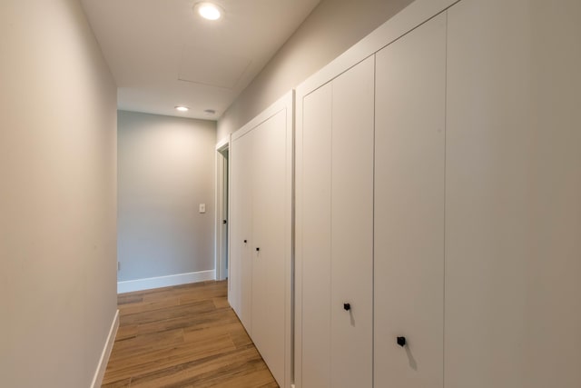 corridor featuring light wood-type flooring