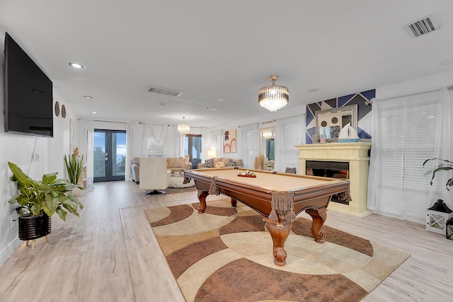 rec room featuring pool table and light hardwood / wood-style floors