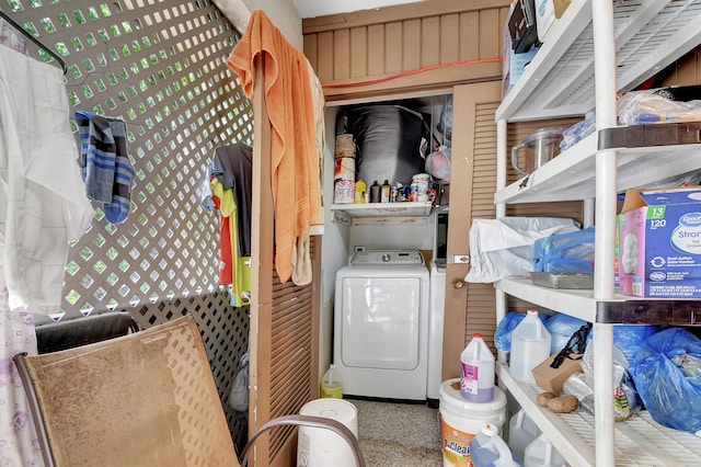 clothes washing area with washer / clothes dryer