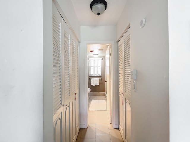 bathroom with vanity and tile patterned floors