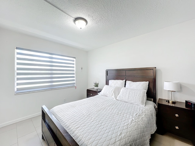 bedroom featuring a textured ceiling