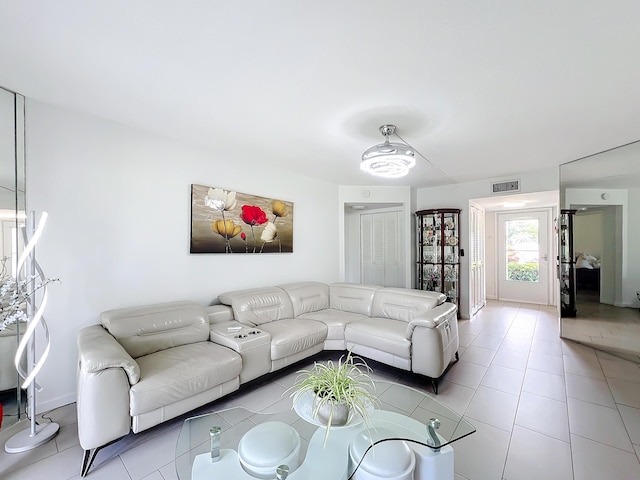 living room featuring light tile patterned floors