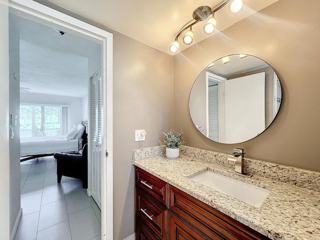 bathroom with vanity and tile patterned floors