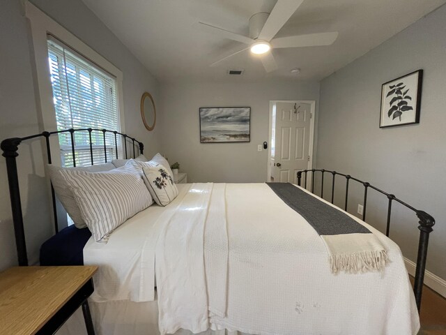 bedroom featuring baseboards