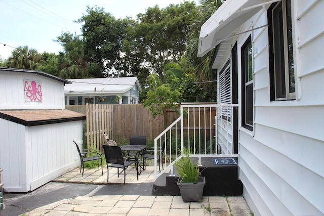 view of patio / terrace with fence