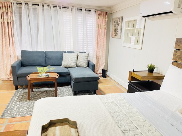 bedroom with a wall unit AC, tile patterned floors, wood ceiling, and crown molding