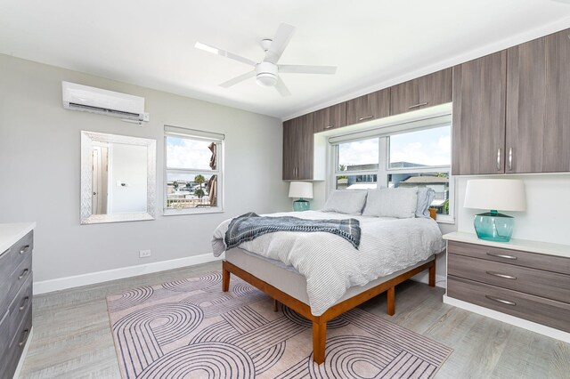 bedroom with light wood-type flooring and ceiling fan