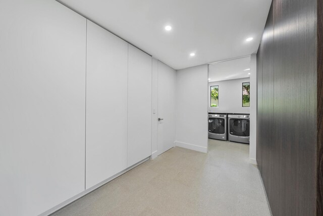 interior space with washer and clothes dryer