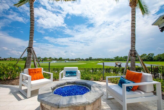 view of patio / terrace with a fire pit