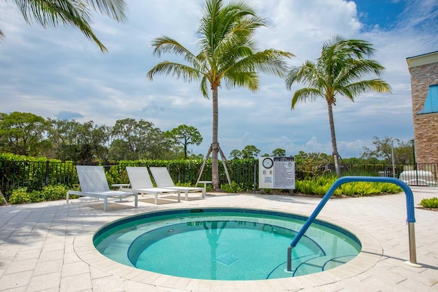 view of swimming pool with a patio