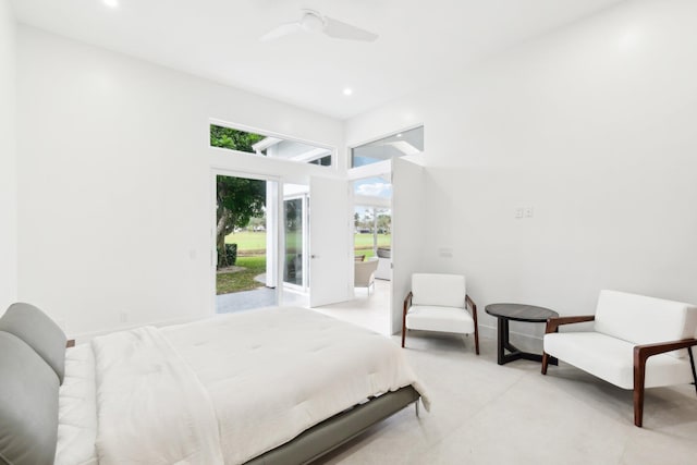 bedroom with access to outside and ceiling fan