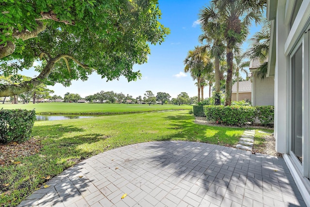 view of patio / terrace with a water view