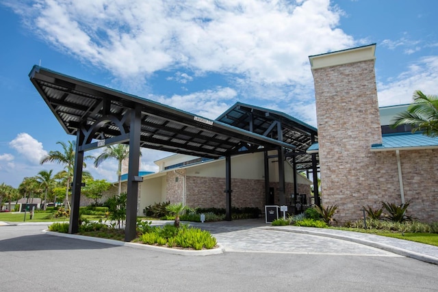 view of parking featuring a carport