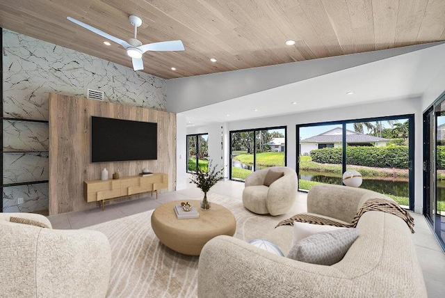 living room with wood ceiling, ceiling fan, lofted ceiling, and light tile patterned flooring