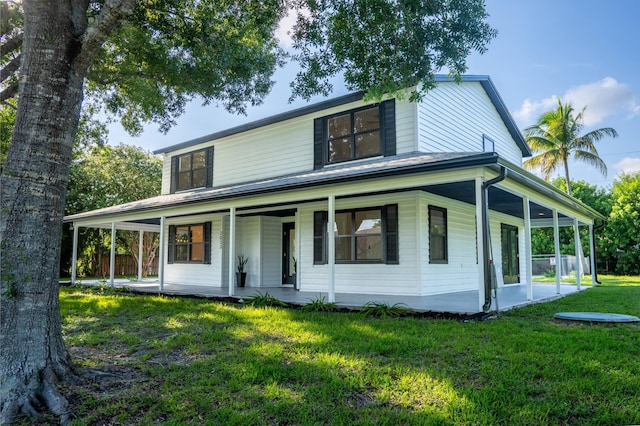 view of front facade with a porch and a front yard