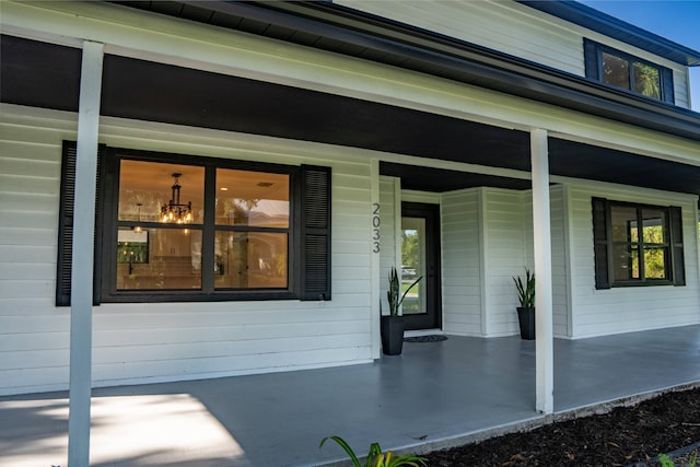 property entrance with a porch