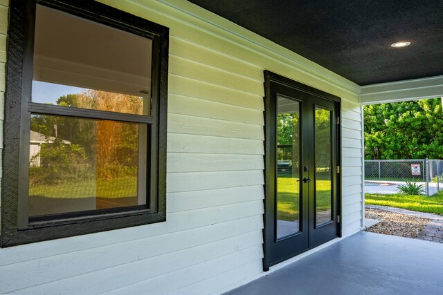 entrance to property featuring french doors