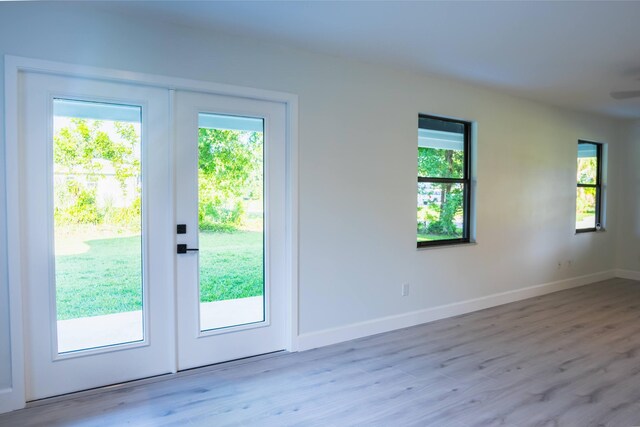 entryway with light hardwood / wood-style flooring