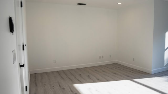 empty room with light wood-type flooring