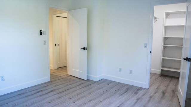 unfurnished bedroom featuring light hardwood / wood-style floors