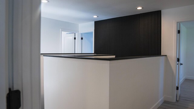 kitchen with hardwood / wood-style floors