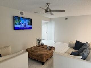 living room featuring ceiling fan