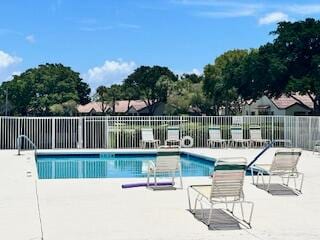 view of pool featuring a patio area