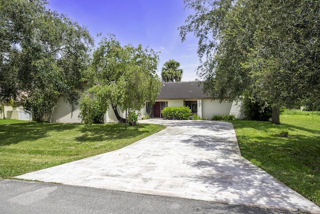 view of front of home with a front lawn