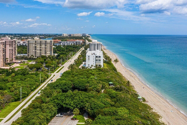 aerial view featuring a water view and a view of the beach